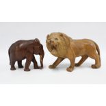 Carved hardwood lion, 19 x 30cm, together with a wooden elephant (2)