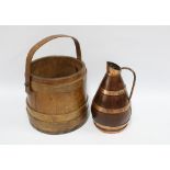 Coopered harvest jug with copper banding, 28cm high and a staved wooden flour basket / tub with