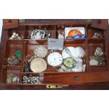 Walnut box containing a selection of silver an costume jewellery together with a gold plated
