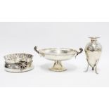 A group of hammered silver items to include a comprt, dish with frilled edge and a vase on tripod