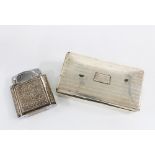 George V silver cigarette box, London 1924 (a/f) together with a white metal table lighter (2)