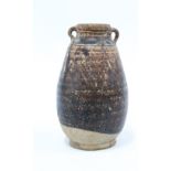 Thailand Sawankhalok brown glazed vase with small loop handles, 12cm high. Provenance: Private
