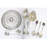 Group of silver items to include a Birmingham silver tea strainer, various spoons, etc (a lot)