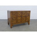 Chinese low cabinet, with eight small apothecary style drawers, 86 x 62 x 41cm.