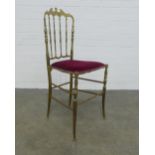 Brass ballroom chair with red upholstered seat, 39 x 90 x 37cm.