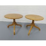 Pair of pine pedestal tables with circular tops, 54 x 48cm. (2)