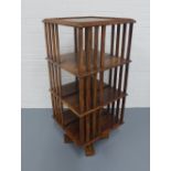 Mahogany revolving bookcase,. 52 x 119cm.