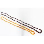 A strand of graduating cherry amber beads, together with a graduating strand of butterscotch amber