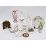 Quantity of porcelain and pottery trinkets to include pill boxes, vases, ewers, pin dishes and a