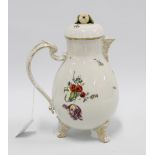 Ludwigsburg coffee pot and cover decorated with floral sprays, raised on three outswept feet, (