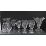 Glassware to include contemporary vases and wine glasses , a moulded glass vase and four goblet