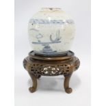 Chinese provincial pottery blue and white jar on a stylised hardwood stand (2) 16cm.