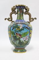 Cloisonne vase with brass dragon handles, decorated with lily leaf foliage, base signed, 38cm high