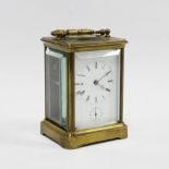 Brass cased carriage clock, striking on a bell, 17cm high, including handle