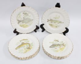 A set of 12 Nethybridge fish patterned plates (12) 23cm.