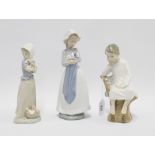 Lladro figure and two Nao Spanish porcelain figures, tallest 25cm (3)