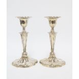 A pair of Victorian silver candlesticks, knop stemmed with a detachable sconce, Sheffield 1898,
