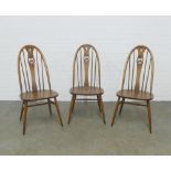 Set of three Ercol Swan back chairs, 46 x 100 x 41cm. (3)