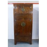 Chinese hardwood wardrobe cabinet, with stylised brass handles and hinges, comprising two parts,