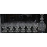 A set of twelve wine glasses and an associated decanter and stopper, early to mid 20th century (
