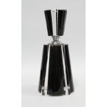 An Art Deco scent bottle and stopper in black with chrome mounts, 20cm.