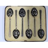 Cased set of six silver coffee spoons, the bowls decorated in black and white enamel, Birmingham