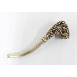 Chinese cast white metal opium pipe with dragon and phoenix pattern, two incised character marks,