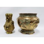 Large Japanese brass jardiniere planter, the exterior with dragon and birds pattern in relief,