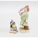 Continental figure of a boy with parasol together with a miniature porcelain figure (2) 12cm.