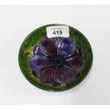 Moorcroft pottery dish, green glazed with anemone pattern, 12cm diameter,