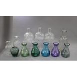 Collection of clear and coloured glass hyacinth / bud vases and bottles (12)