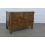 Chinese low cabinet, with eight small apothecary style drawers, 86 x 62 x 41cm.