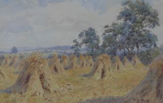 Watercolour of harvest haystacks, apparently unsigned, under glass within a gilt frame, 27 x 18cm