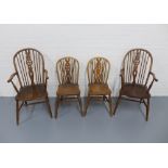 A group of oak / elm four hoop back chairs including two armchairs, 104 x 54 x 47cm. (4)