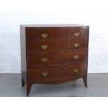 Georgian mahogany bow front chest with four graduating long drawers, brass handles, standing on