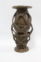 West African bronze vase of baluster form within an entwined ropework frame, 41cm high