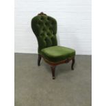 Late 19th / early 20th century green upholstered button back chair, with carved mahogany legs, 55