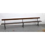 Early 20th century stained pine pew / bench with black iron supports, 330 x 73 x 28cm