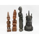 King Oba, a Nigerian carved wood figure together with three other West African carved wood