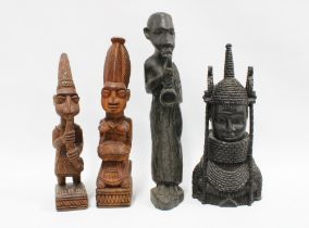 King Oba, a Nigerian carved wood figure together with three other West African carved wood