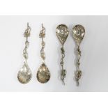 Four Eastern white metal teaspoons, (4)