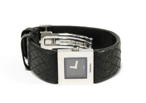 Chanel wristwatch, with square stainless steel frame with a black dial on a textured black leather