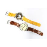 Two Gents TW Steel wristwatches, one with a brown leather strap and the other with an orange leather