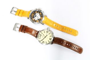 Two Gents TW Steel wristwatches, one with a brown leather strap and the other with an orange leather