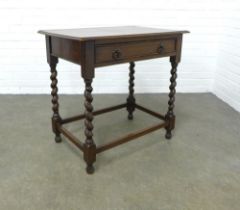 An oak table, the rectangular top above a frieze drawer with barley twist supports, 76 x 72 x 49cm.