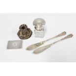 Early 20th century silver topped glass jar / bottle7cm high, two silver butter knives, a small white