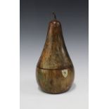 A large fruitwood pear shaped caddy with faux ivory escutcheon, 31cm.