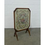 Mahogany folding fire screen, glazed panel with tpesty insert, 52 x 62cm.