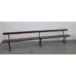 Early 20th century stained pine pew / bench with black iron supports, 330 x 73 x 28cm