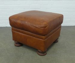 Modern brown leather stool, on four bun feet, 55 x 45cm.